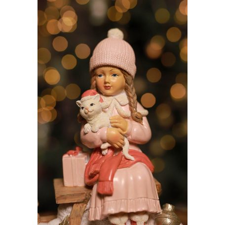 Rózsaszín karácsonyi lány szánon figura - 16 cm