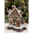 Zenéló és mozgó mézeskalács házikó LED-del - 23 cm